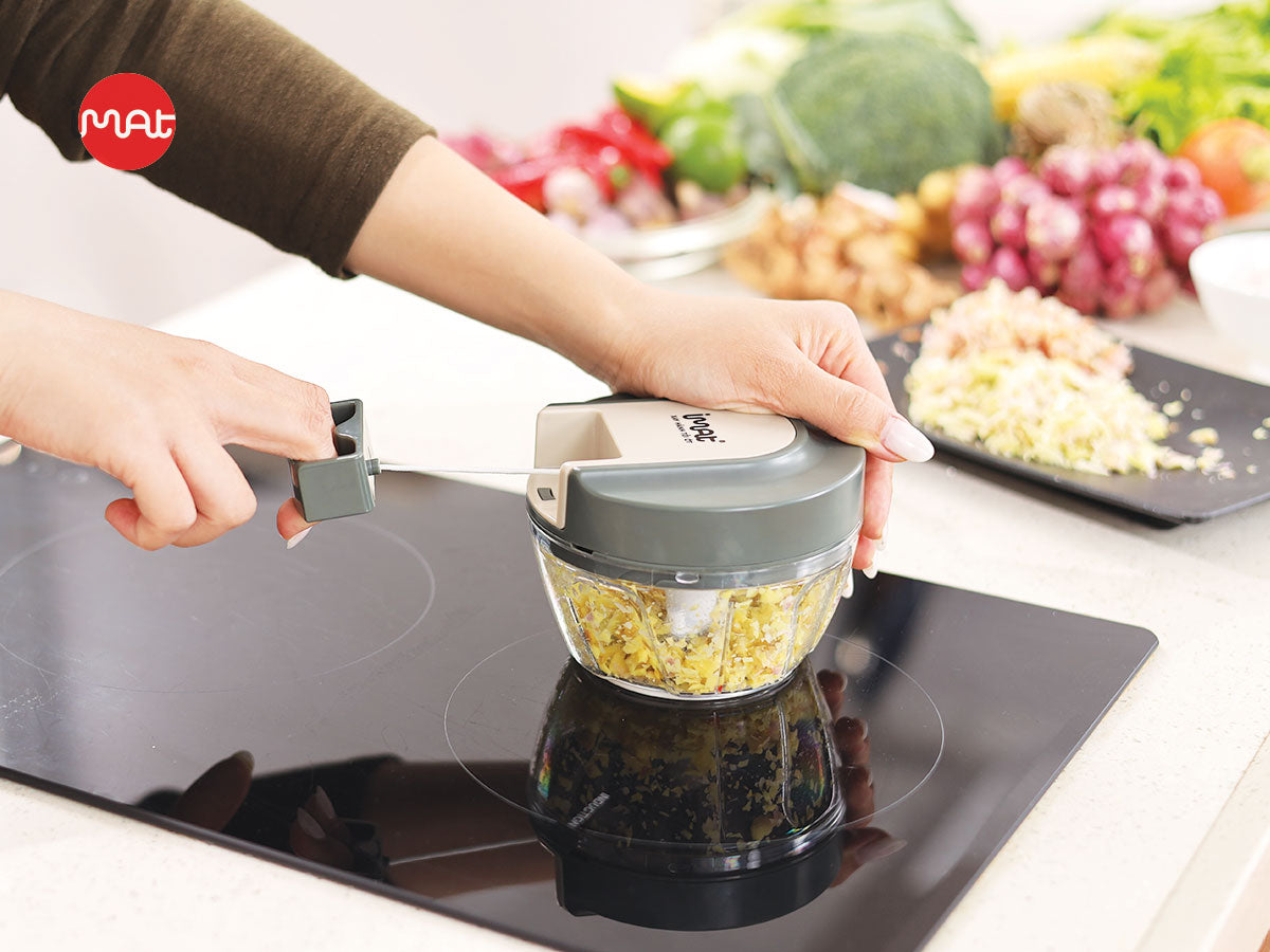 Cối xay tỏi ớt kéo tay cốc Tritan